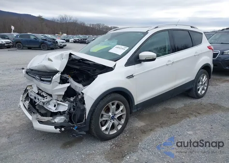 2016 Ford Escape Titanium из США, поврежденный, VIN 1FMCU0J95GUC19159